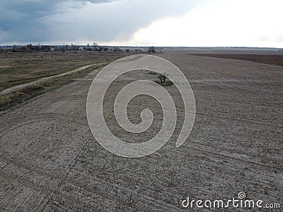 Agricultural field on a cool spring evening, top view Stock Photo
