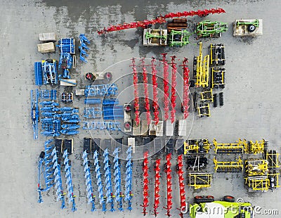 Agricultural machinery, harrows, plows, seeders. View from above Stock Photo