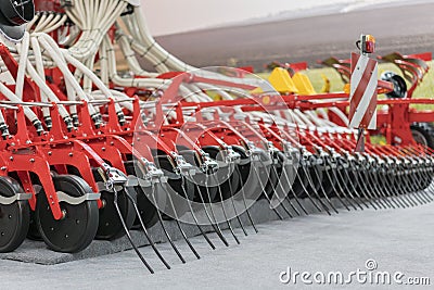 Agricultural machinery for soil cultivation. Agricultural machinery planter in the garage closed for storage until the Stock Photo