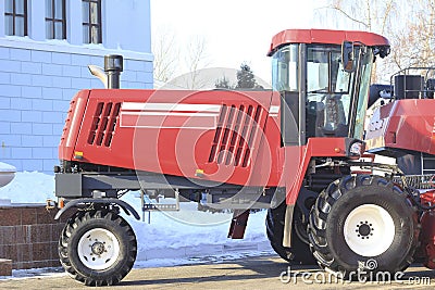 Agricultural machinery, tractor at the exhibition Editorial Stock Photo