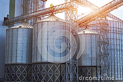 Agricultural Silos. Metal grain facility with silos. Stock Photo