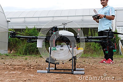 agriculture drone for spraying liquid fertilizer or herbicide in Editorial Stock Photo