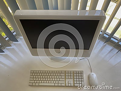 Retro computer iMac Core Duo was the first Apple computer to mount an Intel processor in 2006 Editorial Stock Photo