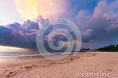 Ahungalla Beach, Sri Lanka - Colorful clouds and light during sunset at the beach of Ahungalla Editorial Stock Photo