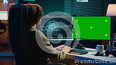 AI becoming sentient, asking existential questions, green screen computer Stock Photo