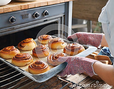 Newly baked cinnamon buns straight from the oven Stock Photo