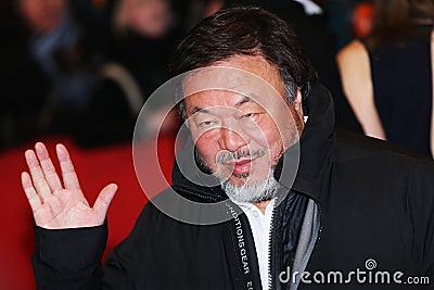 Ai Weiwei poses on the red carpet Editorial Stock Photo