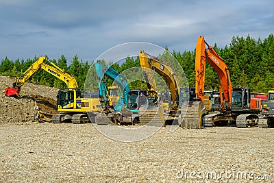 Aidu, Estonia - August 27, 2023: A lot of different tractors have gathered in one place. Quarry heavy tractor equipment Editorial Stock Photo