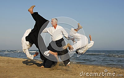 Aikido on the beach Stock Photo