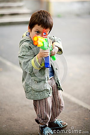 Aiming toy rifle Stock Photo