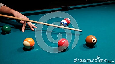 Aiming white ball - pool after shot Stock Photo