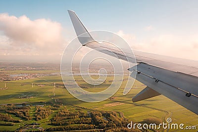 Aiplane wing, landscape aerial and blue sky Stock Photo