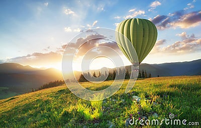 Air ballon above mountains at the summer time. Stock Photo