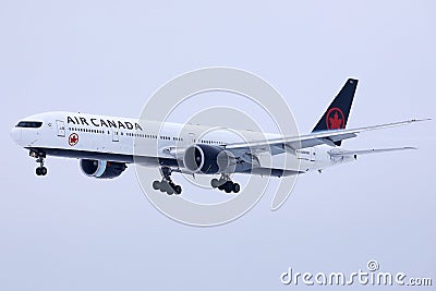 Air Canada plane landing on Munich Airport MUC, snow on runway Editorial Stock Photo