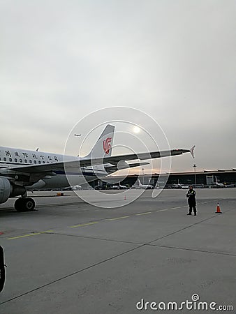 Air China, airport, plane, sunset Editorial Stock Photo