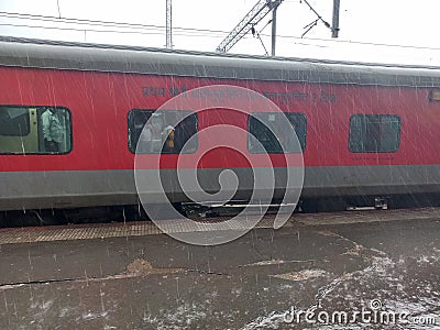 an air-conditioned coach of Indian Railways in a platform Editorial Stock Photo