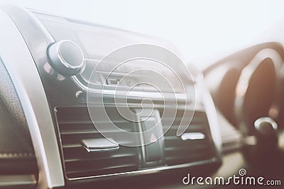 Air conditioner car radio interior listening. changing turning button Radio Stations on Vehicle Multimedia System Stock Photo