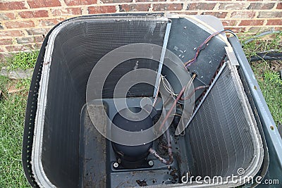 Air conditioner maintenance, compressor condenser coil Stock Photo