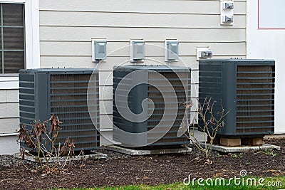 air conditioner near the house unit compressor cool fan Stock Photo