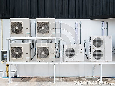 Air conditioner outdoor units outside of building Stock Photo