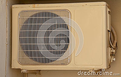 Air conditioner unit compressor outside a home. Condenser Fan for support residential cooling system. conditioning equipment Stock Photo