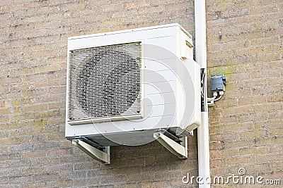 Air conditioning device on a wall Stock Photo