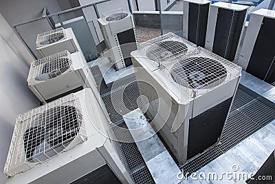 Air conditioning equipment atop a modern building Stock Photo