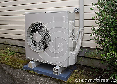 Air conditioning and heating unit for a residential house Stock Photo