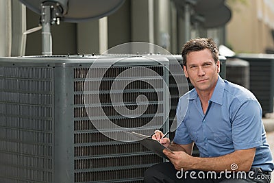 Air Conditioning Repairman Stock Photo