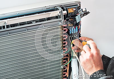 Air Conditioning Technician and A part of preparing Stock Photo