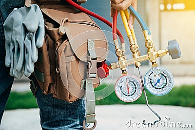 Air Conditioning Technician and A part of preparing to install n Stock Photo