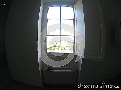 Air conditioning unit with window and interior shutters Stock Photo