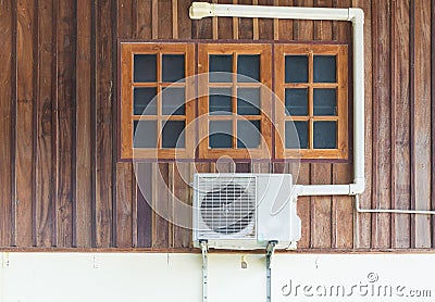 Air conditioning units installed outside the house Stock Photo