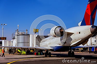 Air DELTA airplane on parking position during pre flight preparation on JFK International Airport Editorial Stock Photo