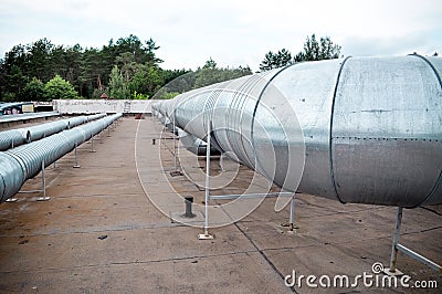 Air ducts on the roof of the building Stock Photo