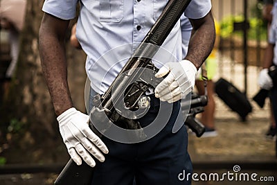 Air force soldiers hold a rifle during celebrations of Brazilian independence in the city of Salvador, Bahia Editorial Stock Photo