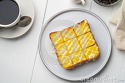 Air fryer grilled butter toast,golden brown crispy bread topped with sugar Stock Photo