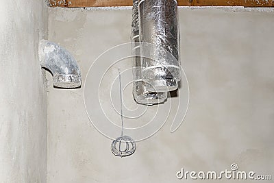 Air inlet and outlet mounted in the house, prepared for mounting the device used for home energy recovery ventilation. Stock Photo