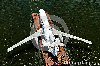 Air-plane is tolled on a platform Editorial Stock Photo