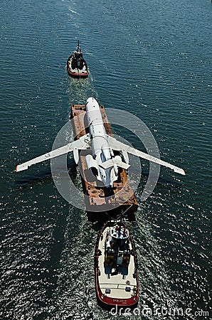 Air-plane is tolled on a platform Editorial Stock Photo