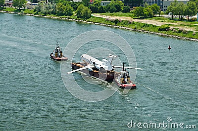 Air-plane is tolled on a platform Editorial Stock Photo