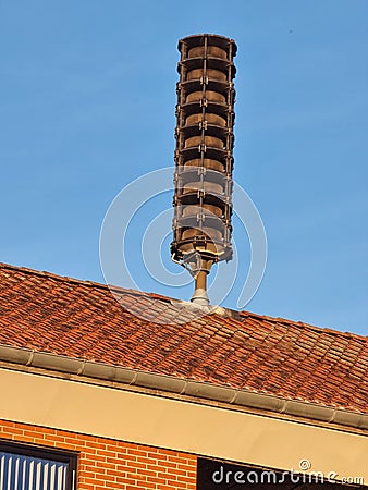 Air raid alarm siren on the roof in Denmark Stock Photo