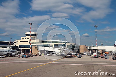 Milan, Italy - Sep 25, 2018: Air terminal complex and plane of UTair airline Editorial Stock Photo