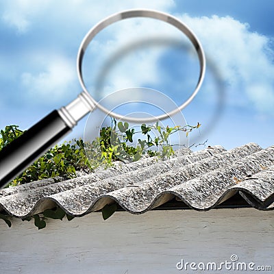 Air testing and monitoring activity around a dangerous asbestos roof - concept image with magnifying glass Stock Photo