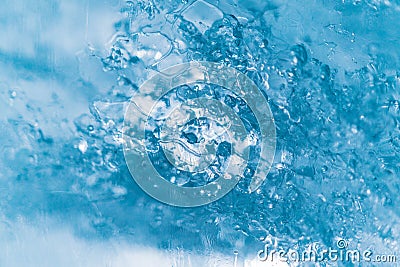 Air trapped inside ice, glacier macro, abstract blue wallpaper Stock Photo