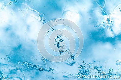 Air trapped inside ice, glacier macro, abstract blue wallpaper Stock Photo