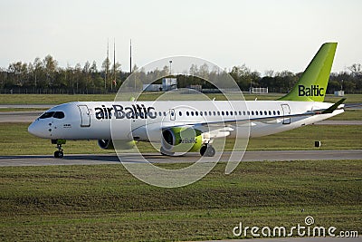 AirBaltic jet plane taxiing in airport Editorial Stock Photo