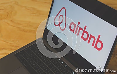 Airbnb logo on laptop screen Editorial Stock Photo