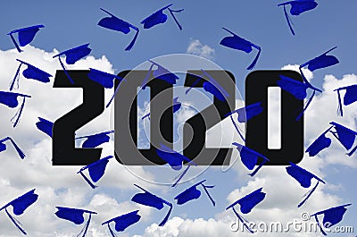 Blue 2020 graduations caps in sky Stock Photo