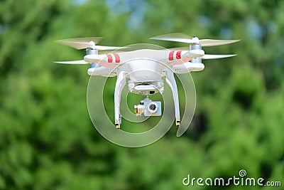 Airborne Quadcopter With Camera Stock Photo